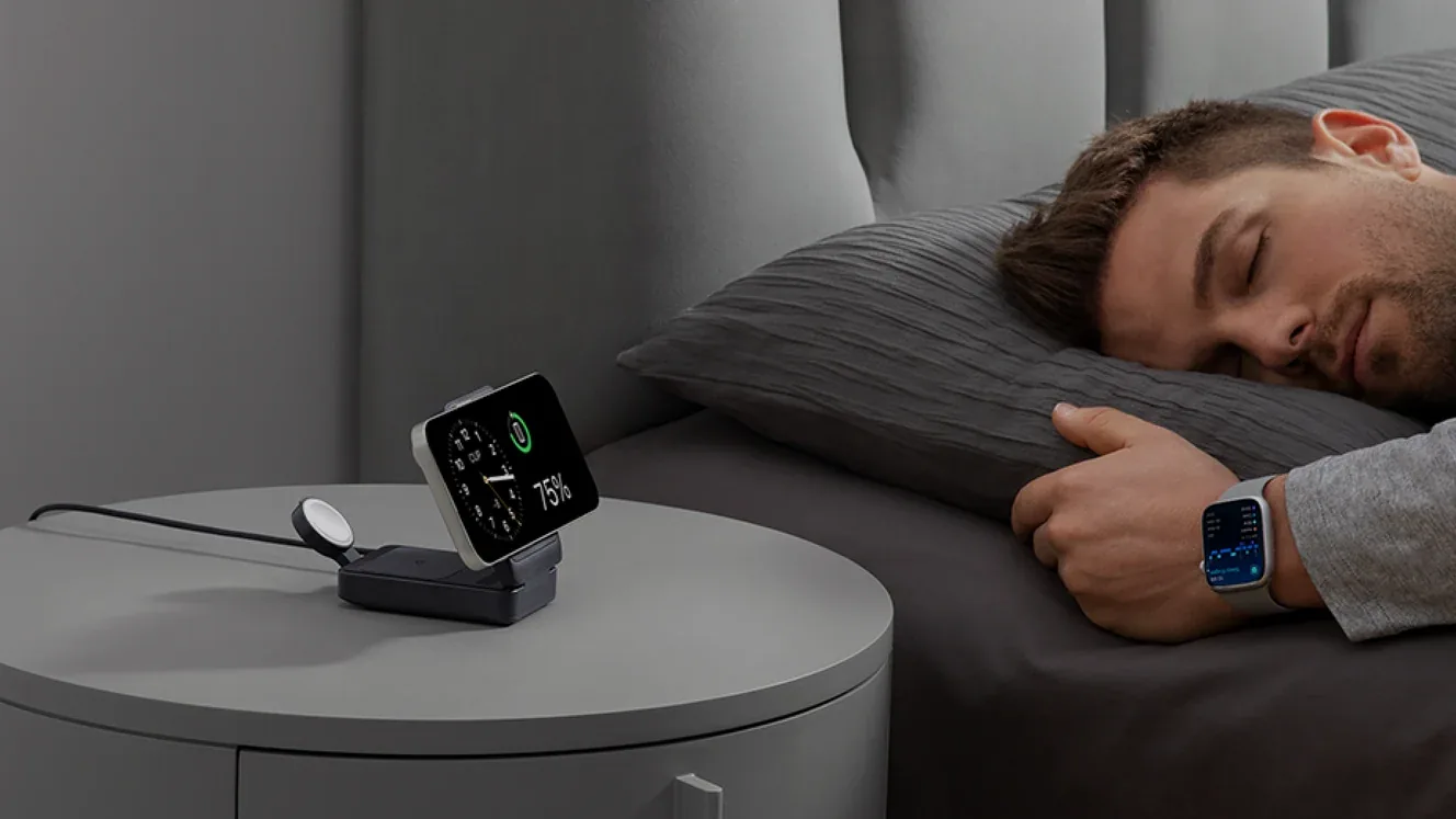 Anker MagGo Foldable 3-in-1 on a nightstand with an iPhone in landscape StandBy