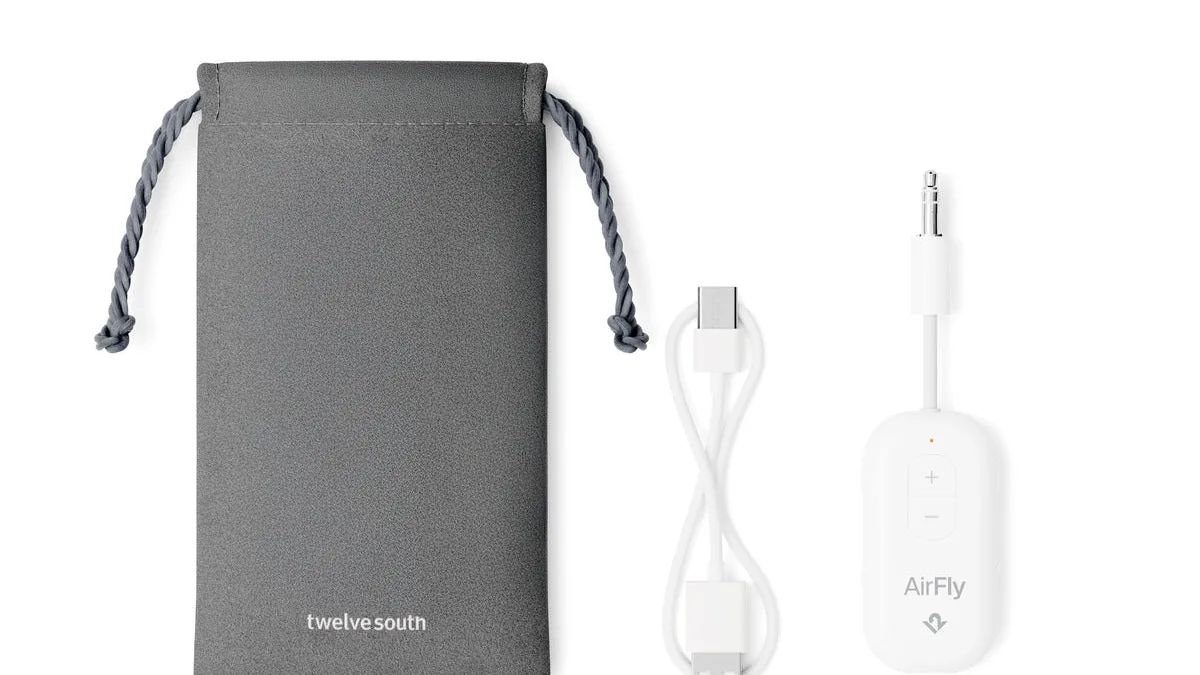 AirFly Pro 2 transmitter with its travel bag and USB-C charging cable
