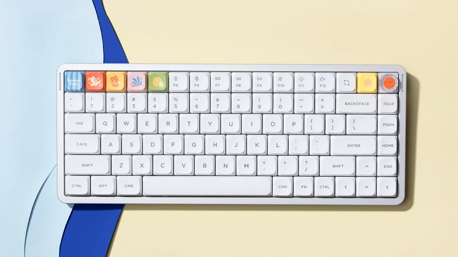 NuPhy Air75 V3 in white with colored accent keys on a light desk